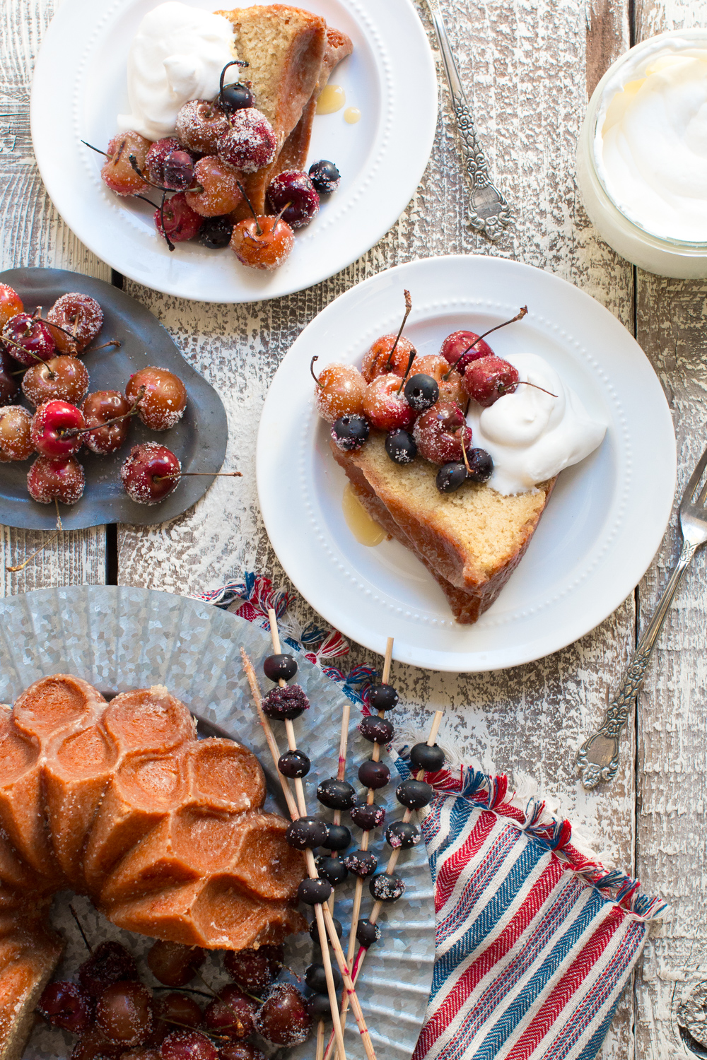 Brown Butter Bourbon Bundt Cake with Grilled Cherries, Blueberries and Whipped Cream