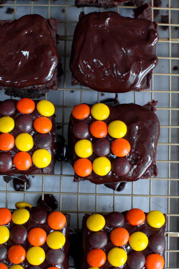 Top each brownie with a row of Reese's Pieces