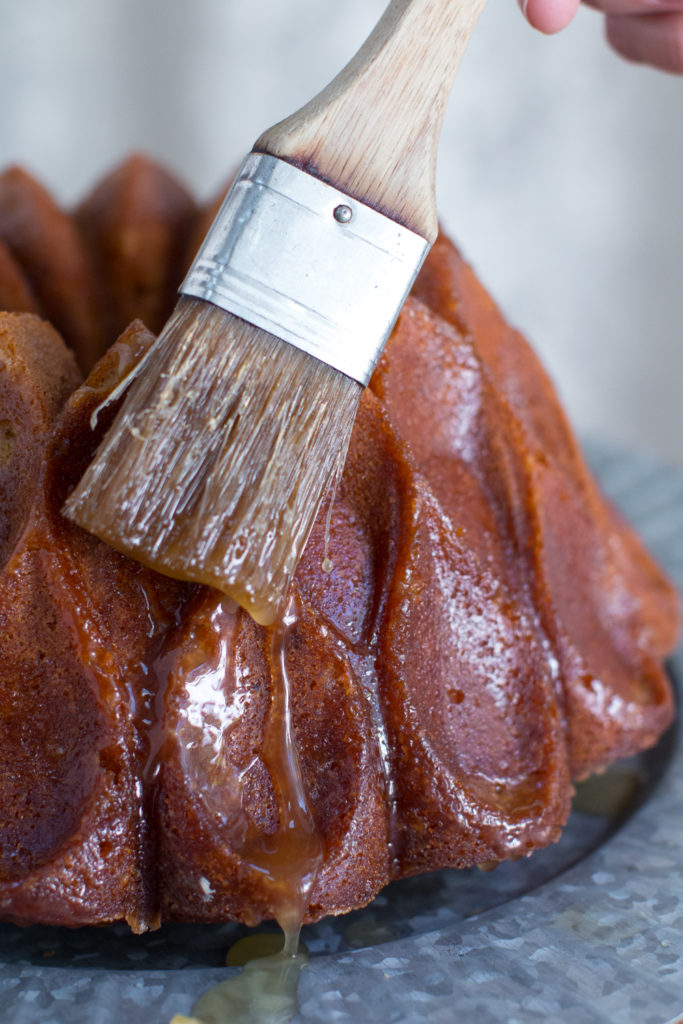 Brush the bundt cake with salted bourbon glaze