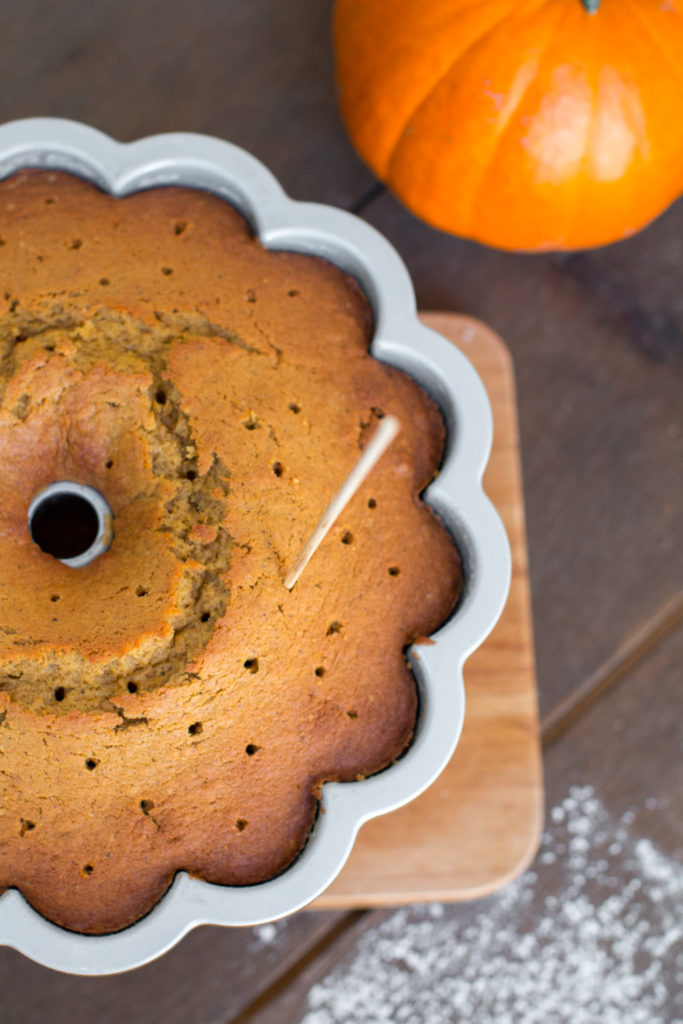 poke holes in the bottom of the bundt cake
