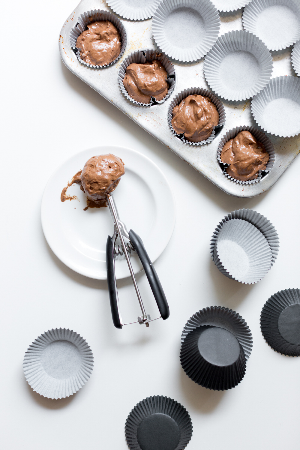 Scoop the batter into muffin tins lined with cupcake liners