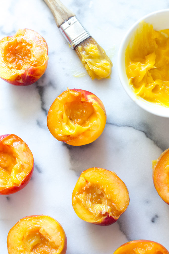 Halve the nectarines and brush the tops with honey butter mixture just before grilling.