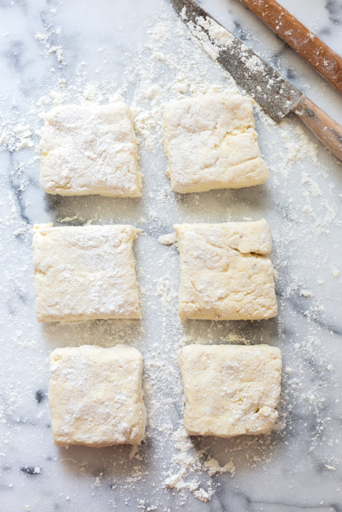 Slice the shortcake dough into 6 equal squares.