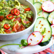Guacamole with Spicy Cucumbers and Radishes.