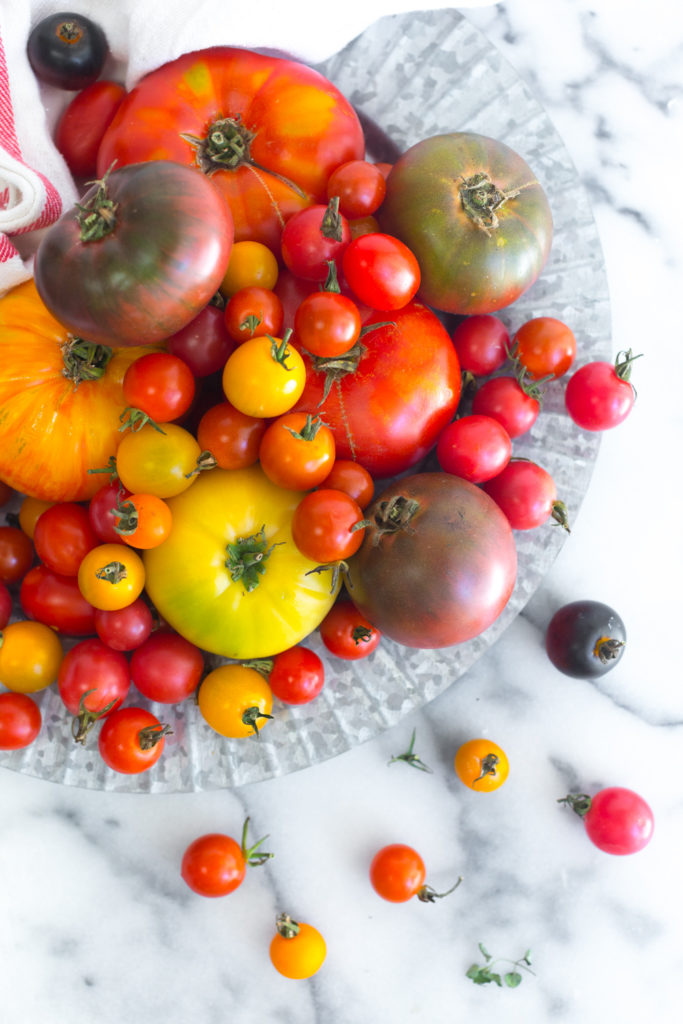 heirloom tomatoes of all sizes