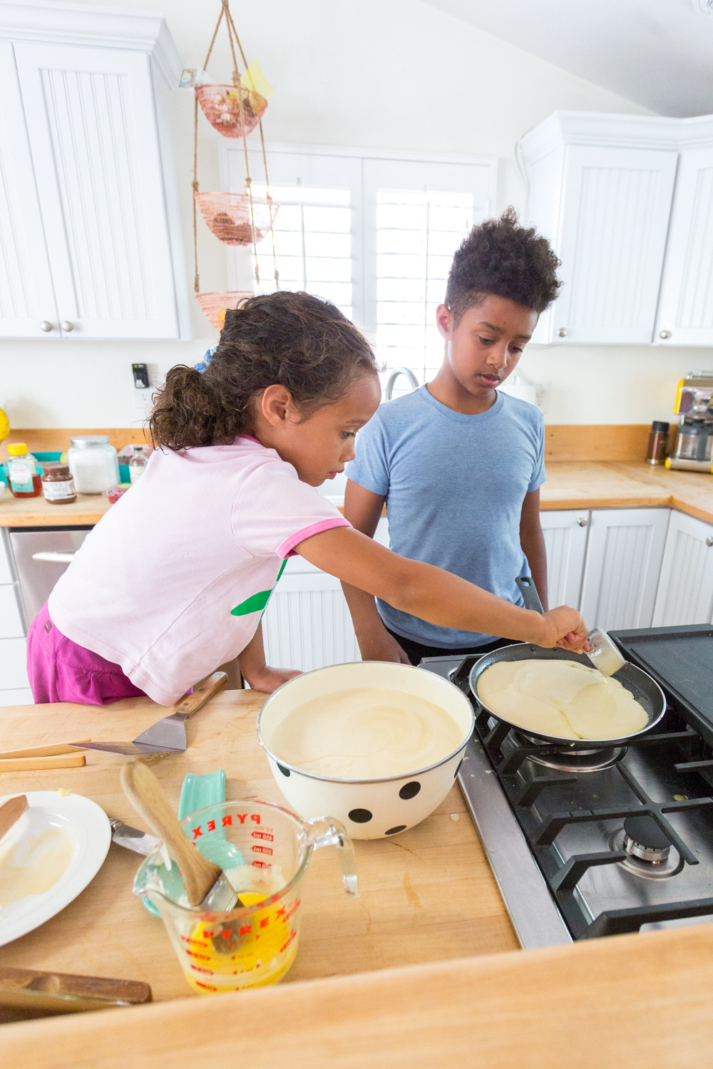 Anu pouring batter for The Best Basic Crepes