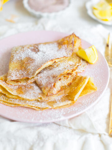 The Best Basic Crepes by with cinnamon sugar and lemon.