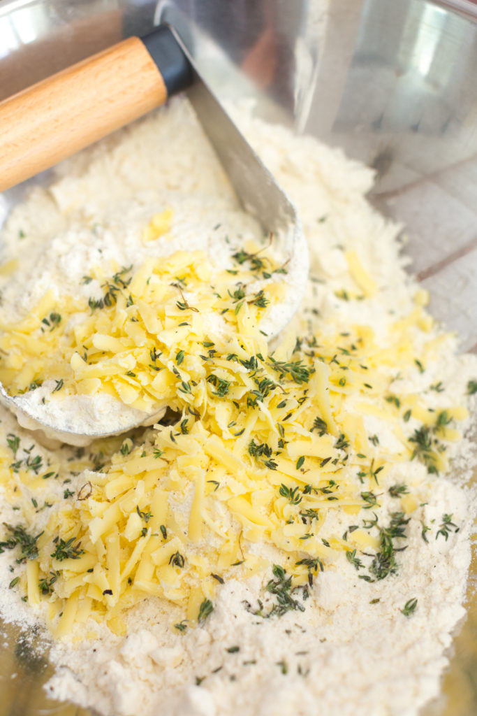 blending cheddar into scone dough
