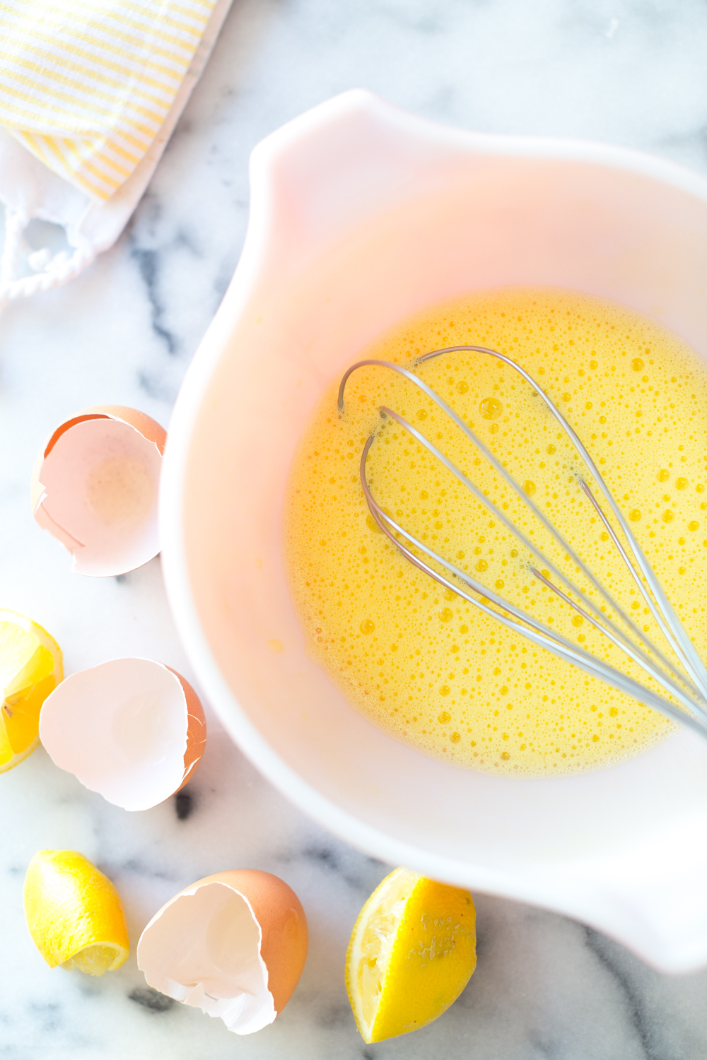 Avgolemono Soup whisking eggs and lemon