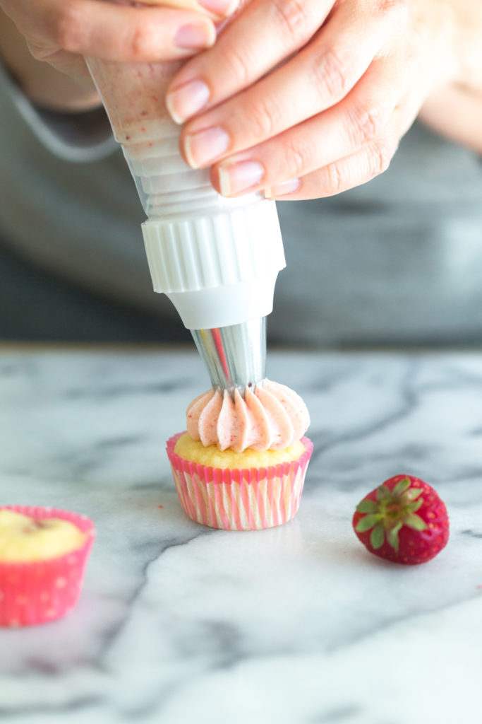 piping frosting with an ope star tip