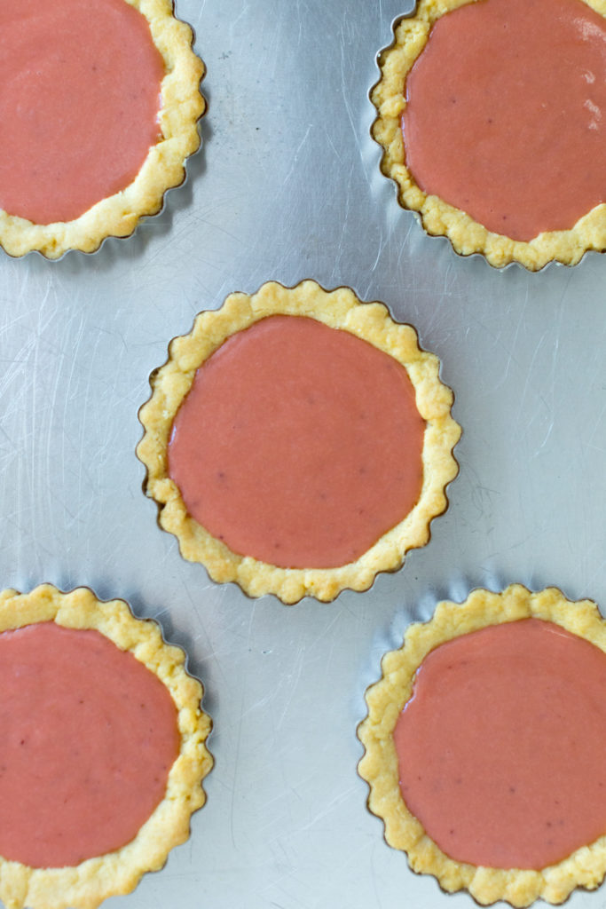 Filling tartlet shells with Strawberry Rhubarb Curd