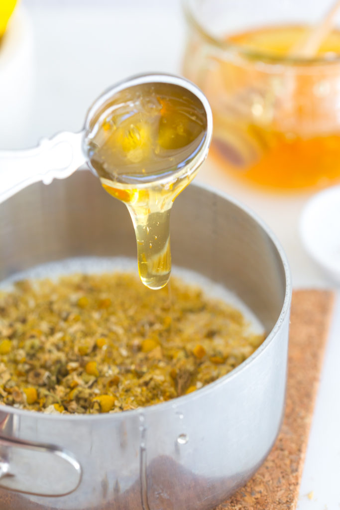 steeping tea with milk and honey