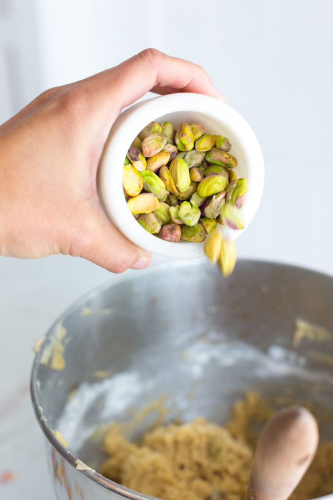 adding pistachios to skillet cookie dough