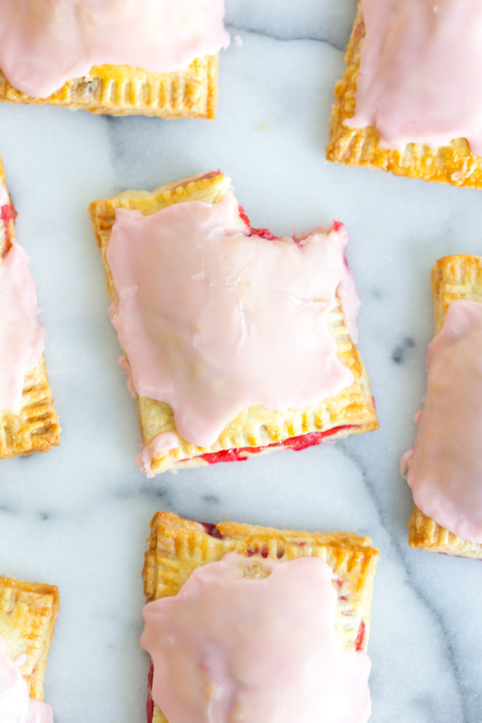 Raspberry Rhubarb Pink Peppercorn Hand Pies bite