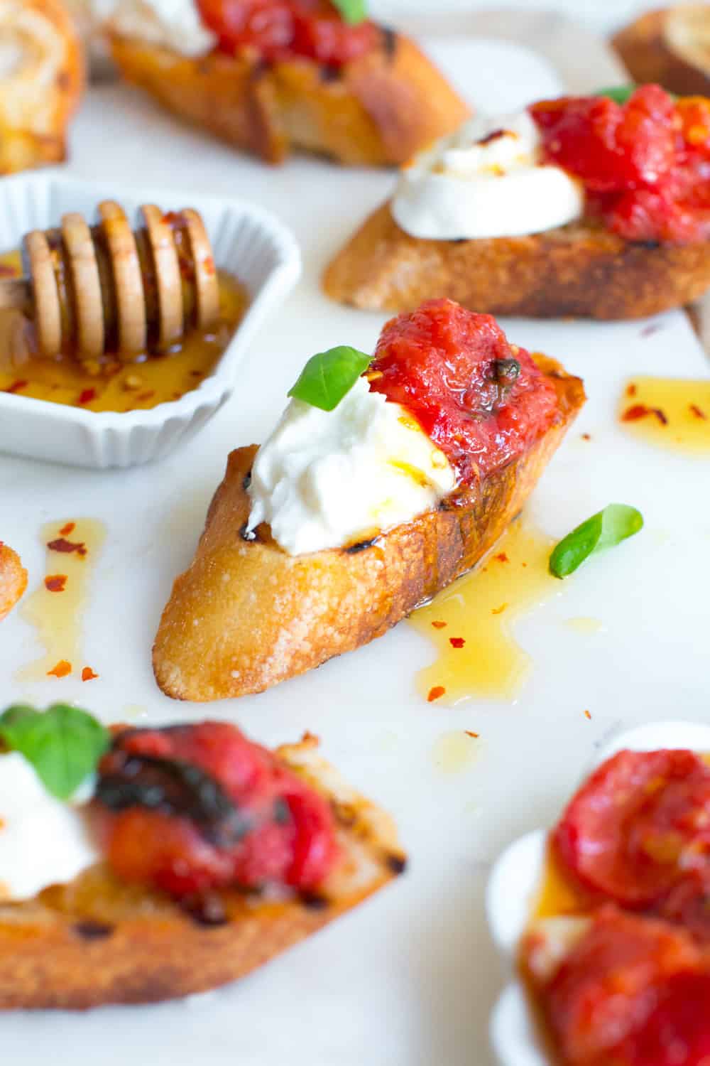 Tomato Confit Burrata Crostini