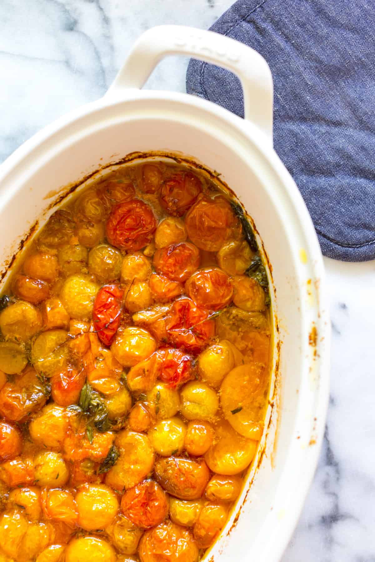 Roasted cherry tomatoes in olive oil bath