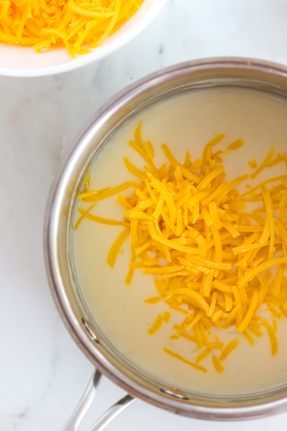 Making dip for Dill Pretzels with Cider Cheese Dip