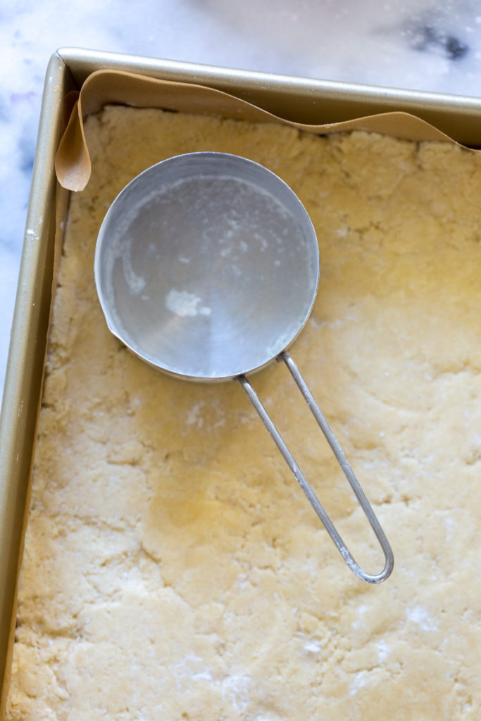 Grapefruit Coconut Bars shortbread dough pressing