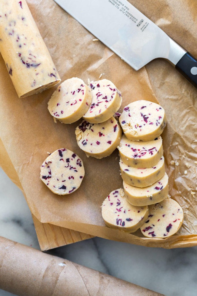 Slicing Glazed Hibiscus Shortbread Cookies