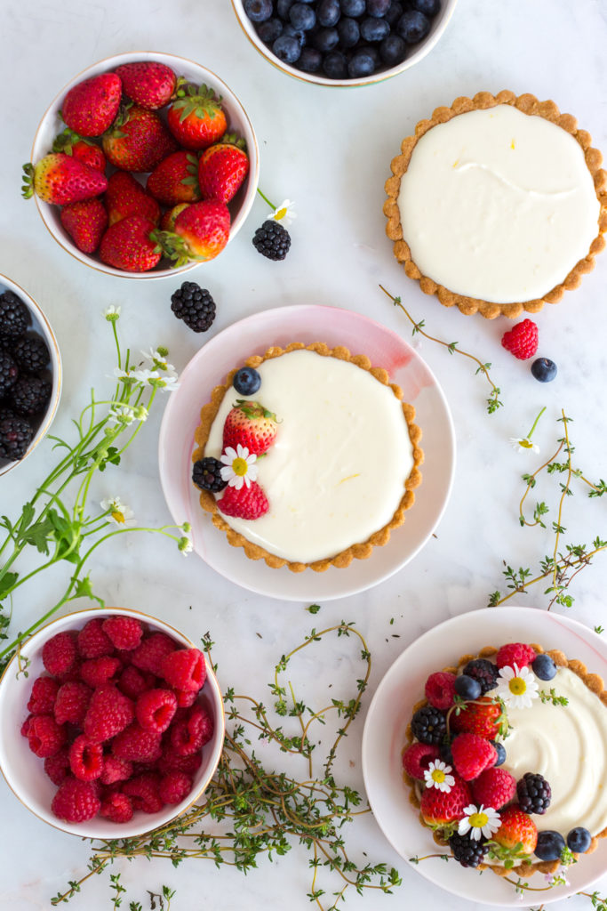 Assembling Berry Mascarpone Tarts with Almond Shortbread Crust