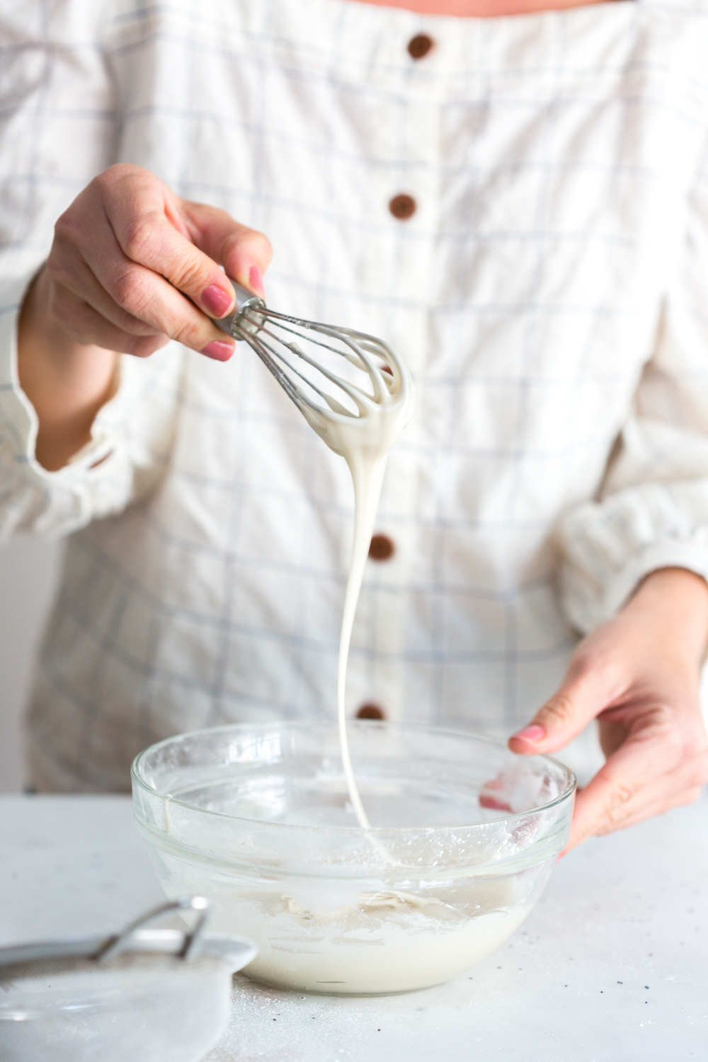Making icing for Blueberry Poppy Seed Banana Bread