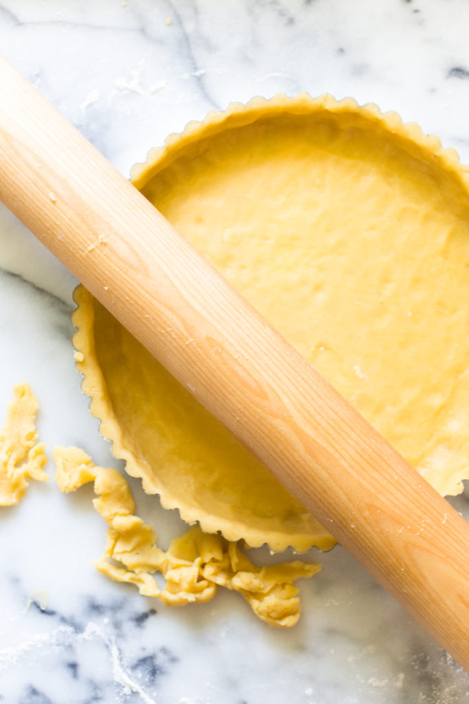 Removing excess dough from Basic Tart Dough