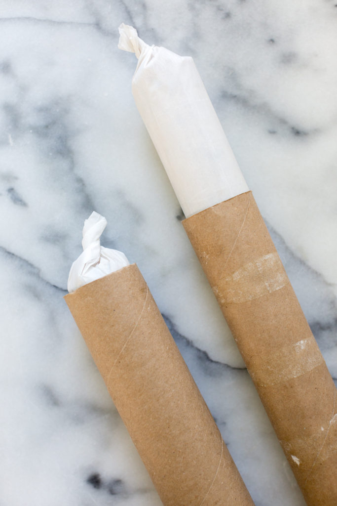 Shortbread cookie dough logs in paper towel rolls to keep round shape