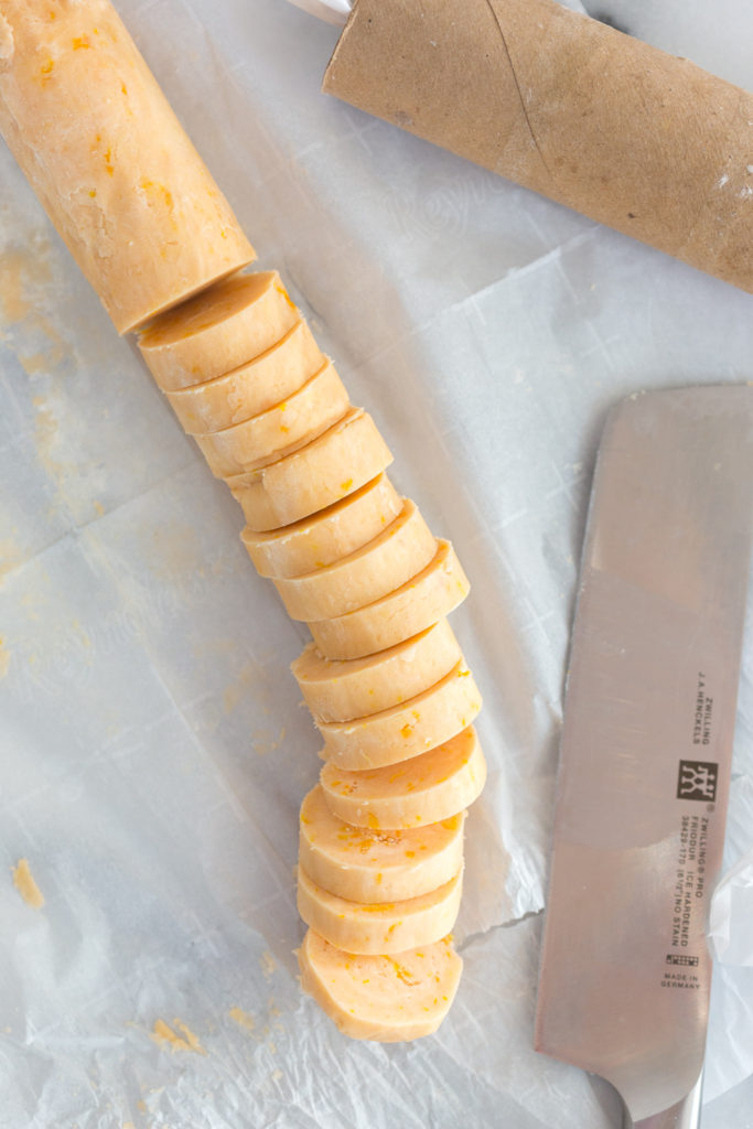 Slicing shortbread cookie dough log