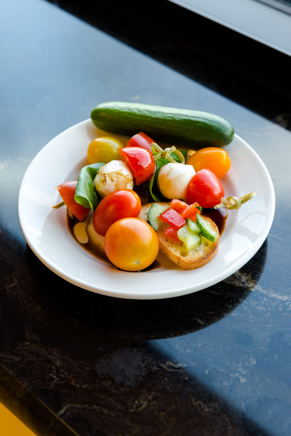 Enjoying the fresh tomatoes and cucumbers from Houweling's in Camarillo, CA
