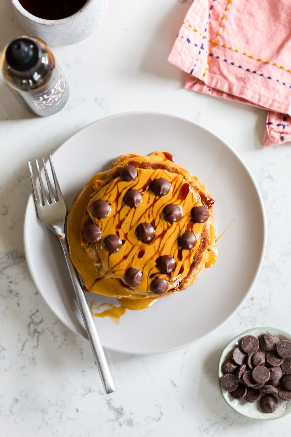 Gluten Free Almond Flour Banana Pancakes with almond butter, Just Date Syrup and dark chocolate chips