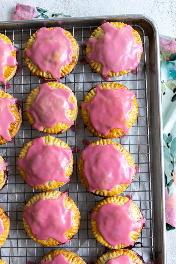 Glazed Cherry Hand Pies with Cream Cheese Crust