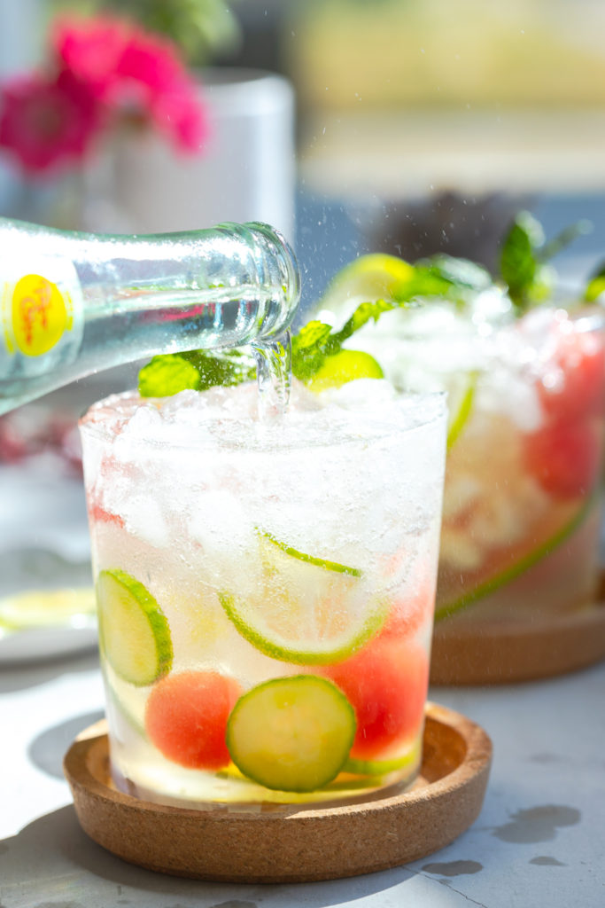 Topping off sangria with Topo Chico