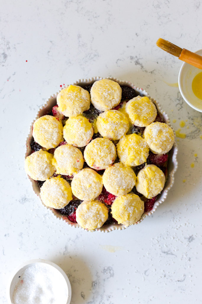 Baby biscuits on fruit cobbler