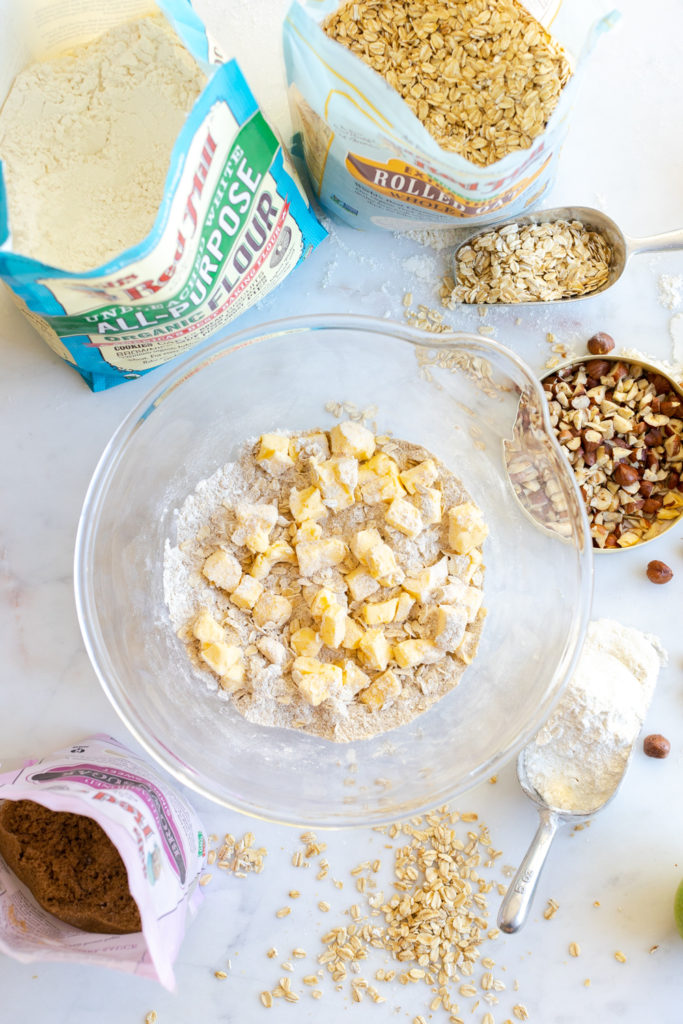 adding butter to crisp topping