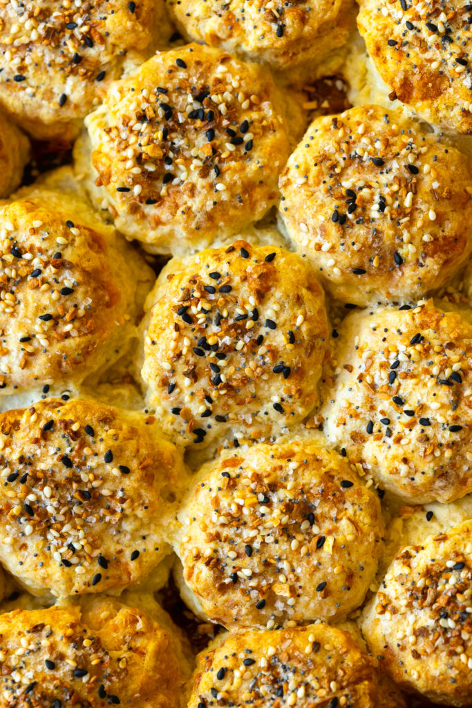 Cheddar Everything Biscuits baked atop cherry tomato filling