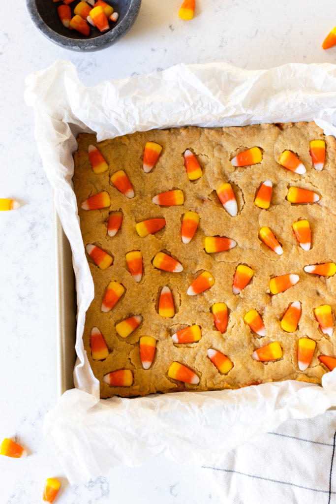 Pressing Candy Corn into Blondies