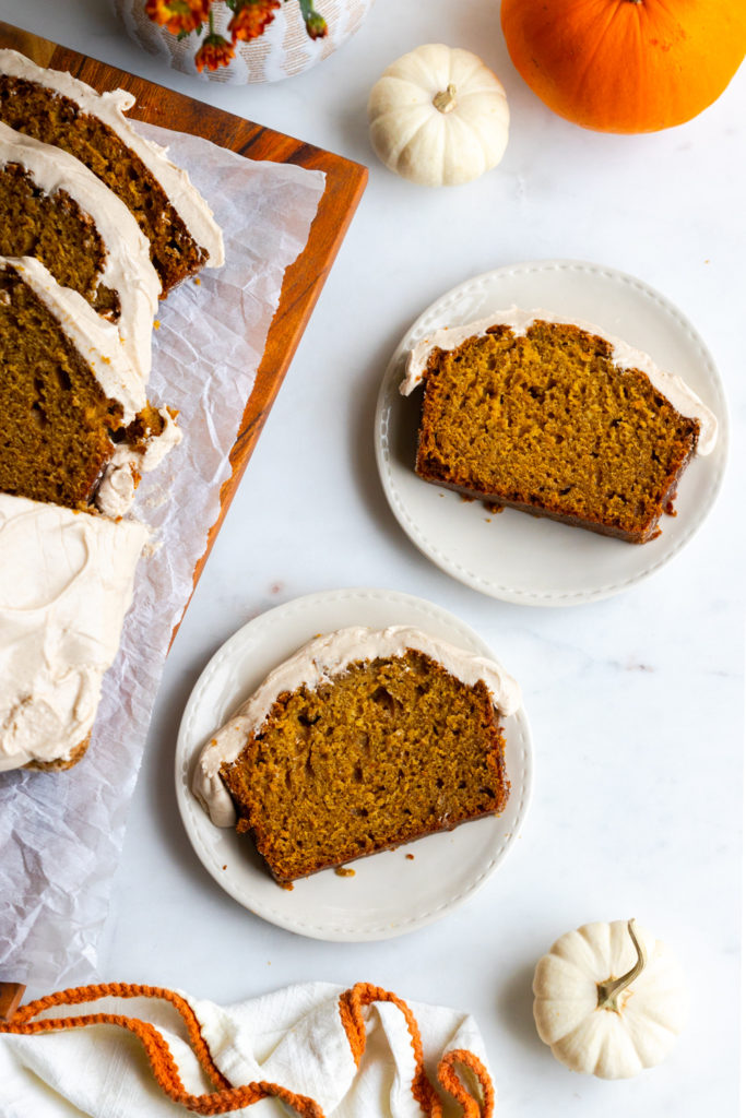 Slices of Pumpkin Spice Bread with Maple Cream Cheese Frosting