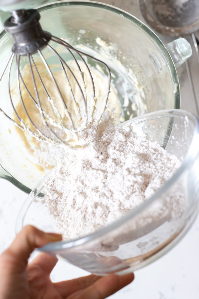 Mixing Whisking butter and maple syrup for Maple Cream Cheese Frosting