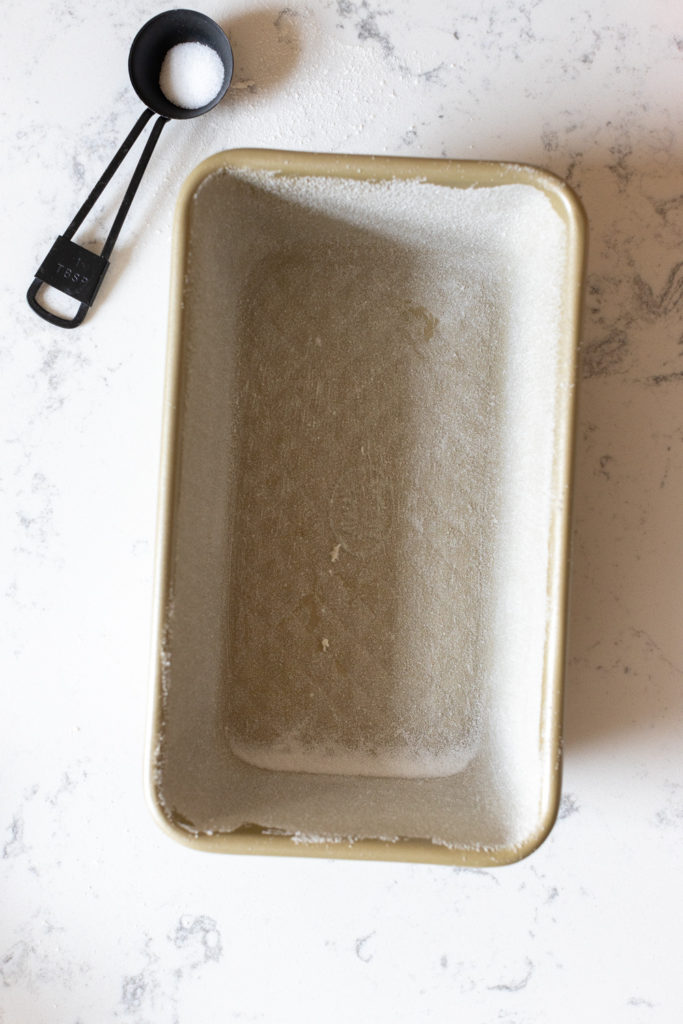 Greased and sugared loaf pan