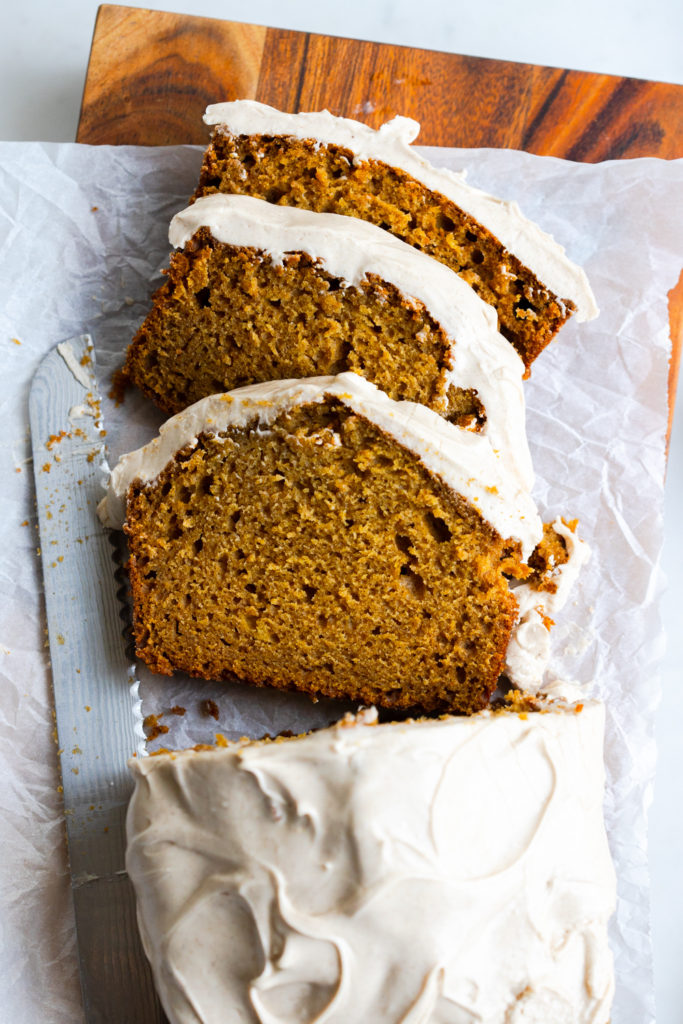 Sliced Pumpkin Spice Bread with Maple Cream Cheese Frosting