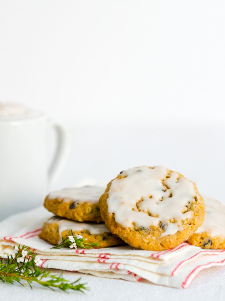 Iced Orange Currant Oatmeal Cookies for 1 close up shot straight on at table height