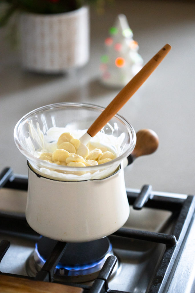 melting white chocolate melting wafers on the stove