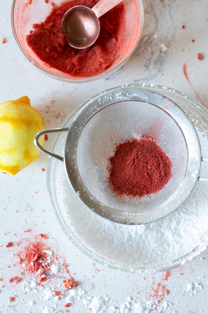 sifting freeze dried strawberries