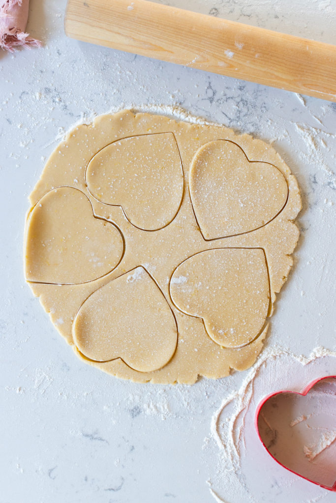 Cutting Strawberry Lemon Heart Cookies