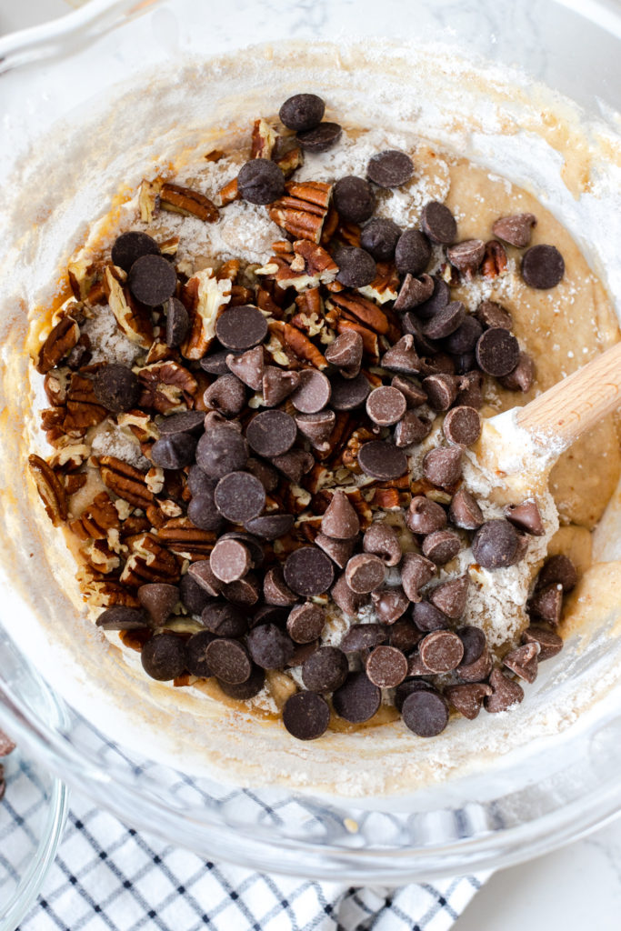 Stirring Brown Butter Pecan Chocolate Chip Banana Bread batter