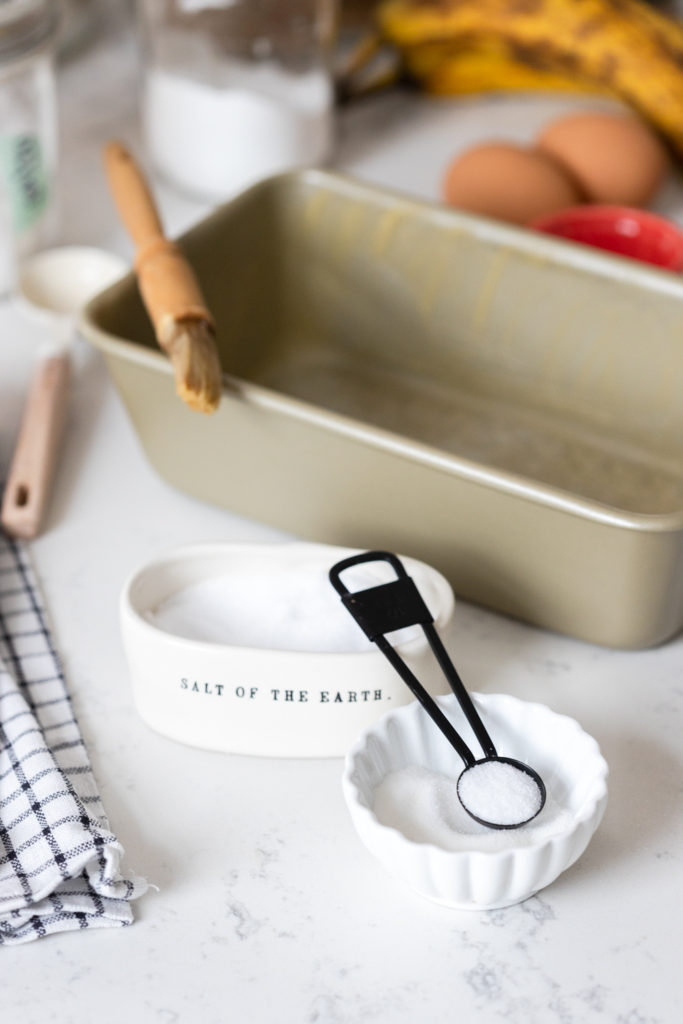 Buttering and sugaring a loaf pan