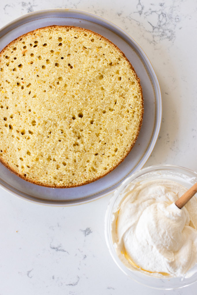 filling the cake with Meringue Buttercream Filling