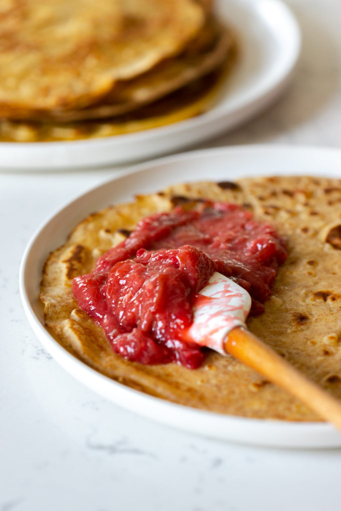 Adding Rhubarb compote to Rye Crepes