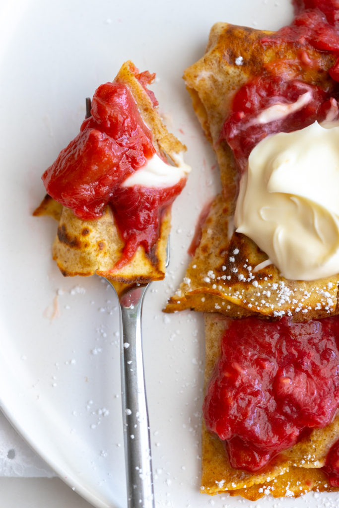 Rye Crepe bite with Rhubarb Raspberry Ginger Compote and crème fraîche