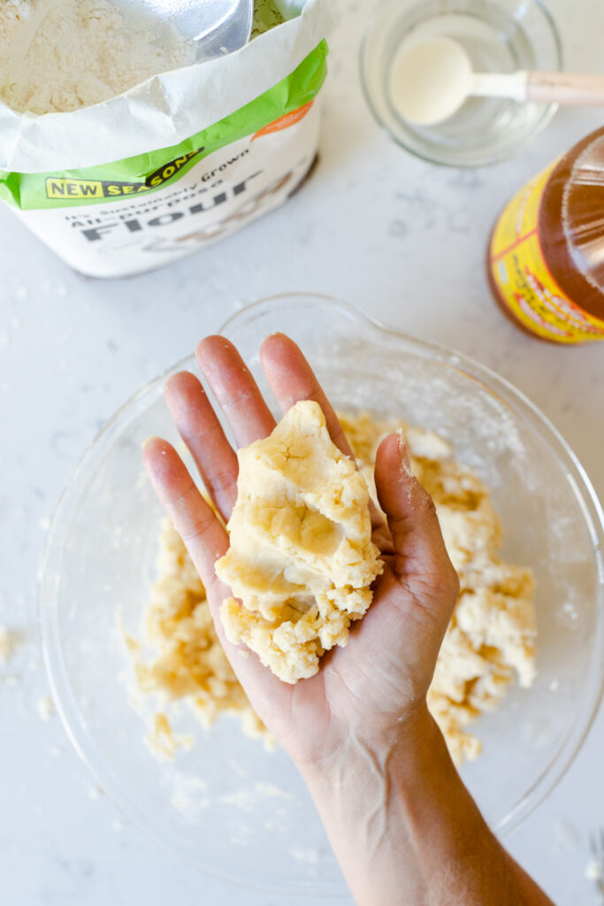 after the squeeze, the dough should just barely stick together